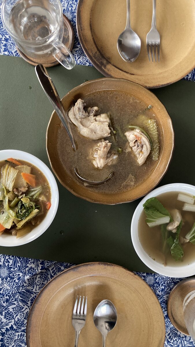 Soup and rice, served in stoneware, on an ordinary weekday. Handmade Philippine stoneware by AWIS in everyday use.