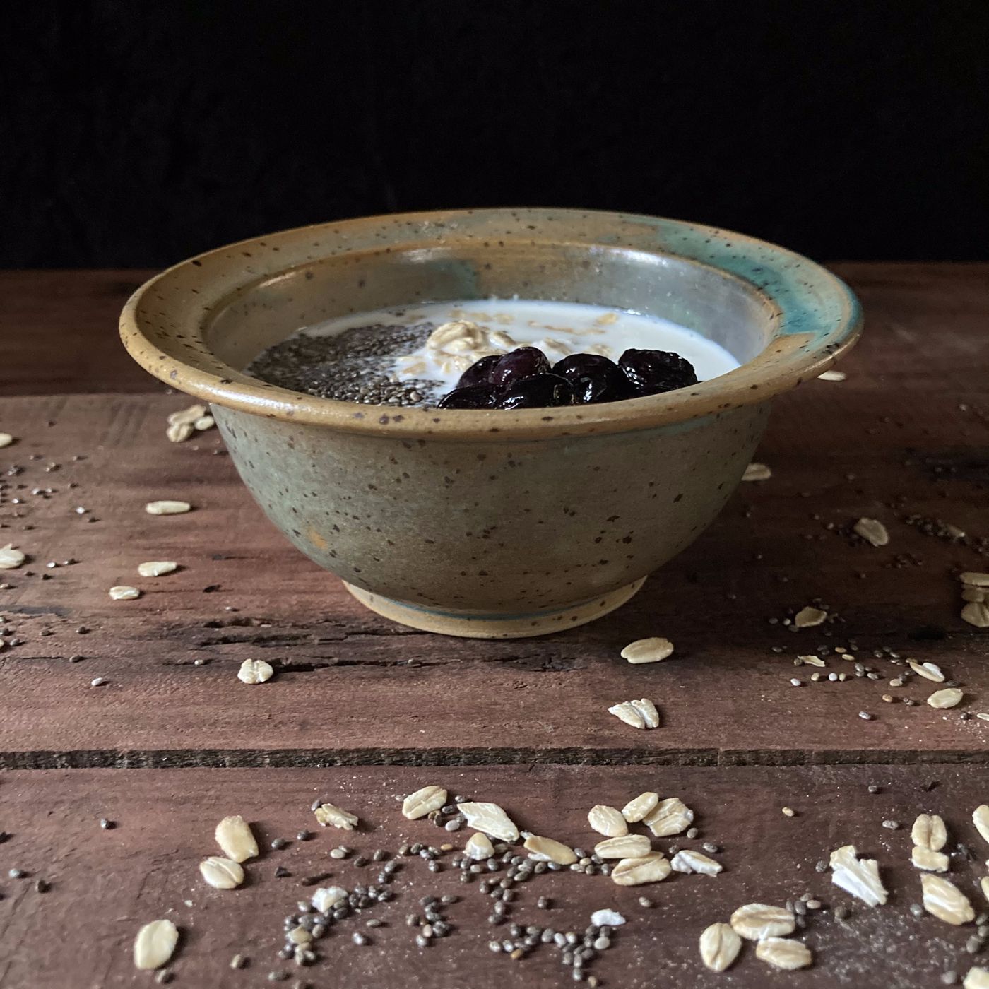 A stoneware bowl photographed with food